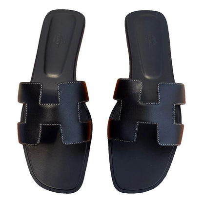 Hermès Pink Leather Oran Sandals