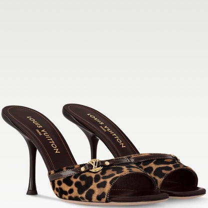 Louis Vuitton Leopard print mules